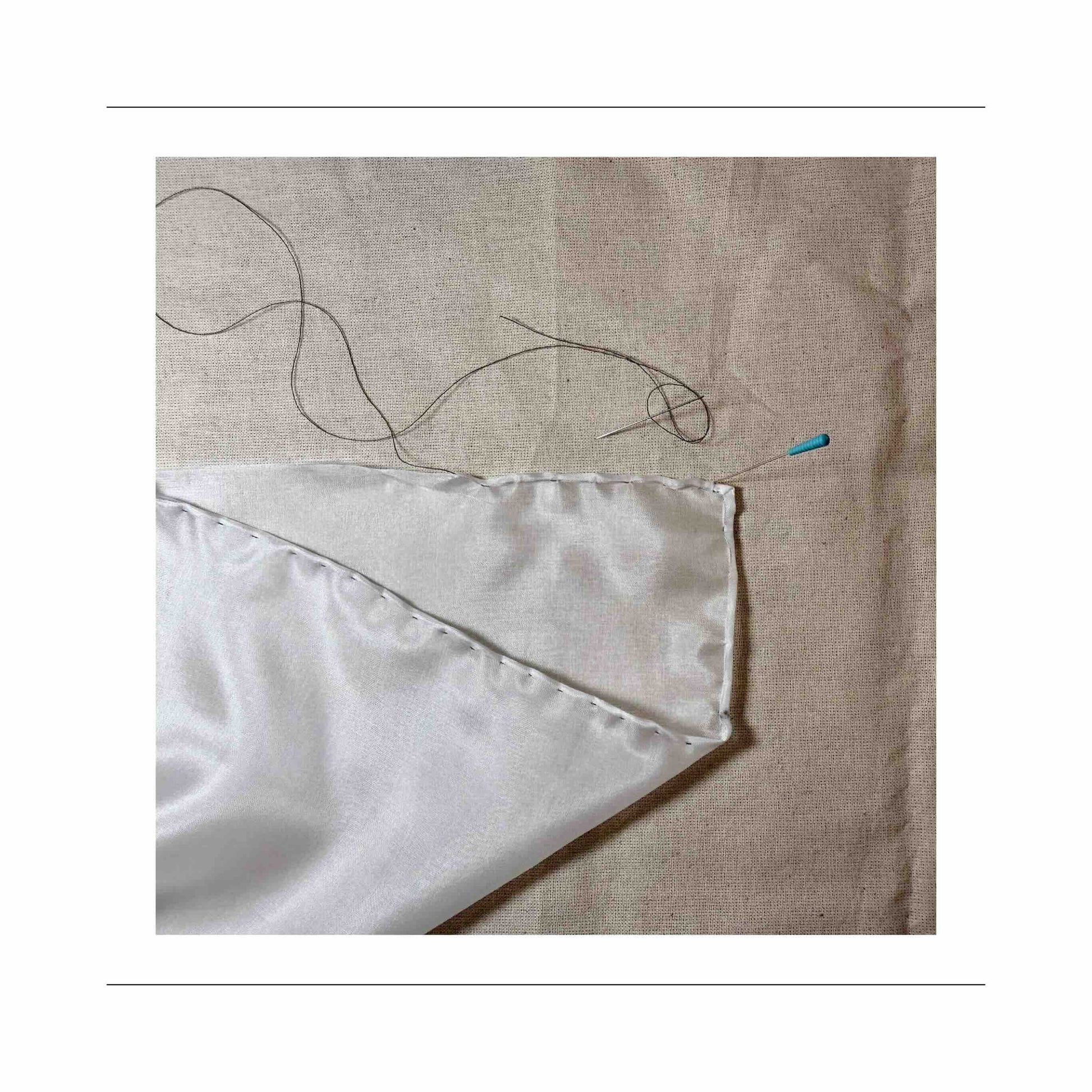 How to sew a silk pocket square with rolled hem by Jane Harbison Design