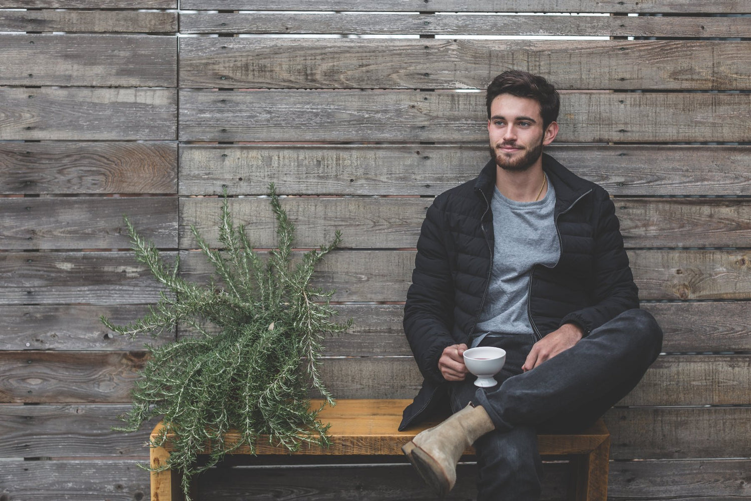 contented man in capsule wardrobe